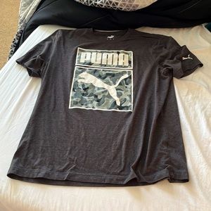 This is a Gray Puma T-shirt. It is an XL. It is an awesome shape